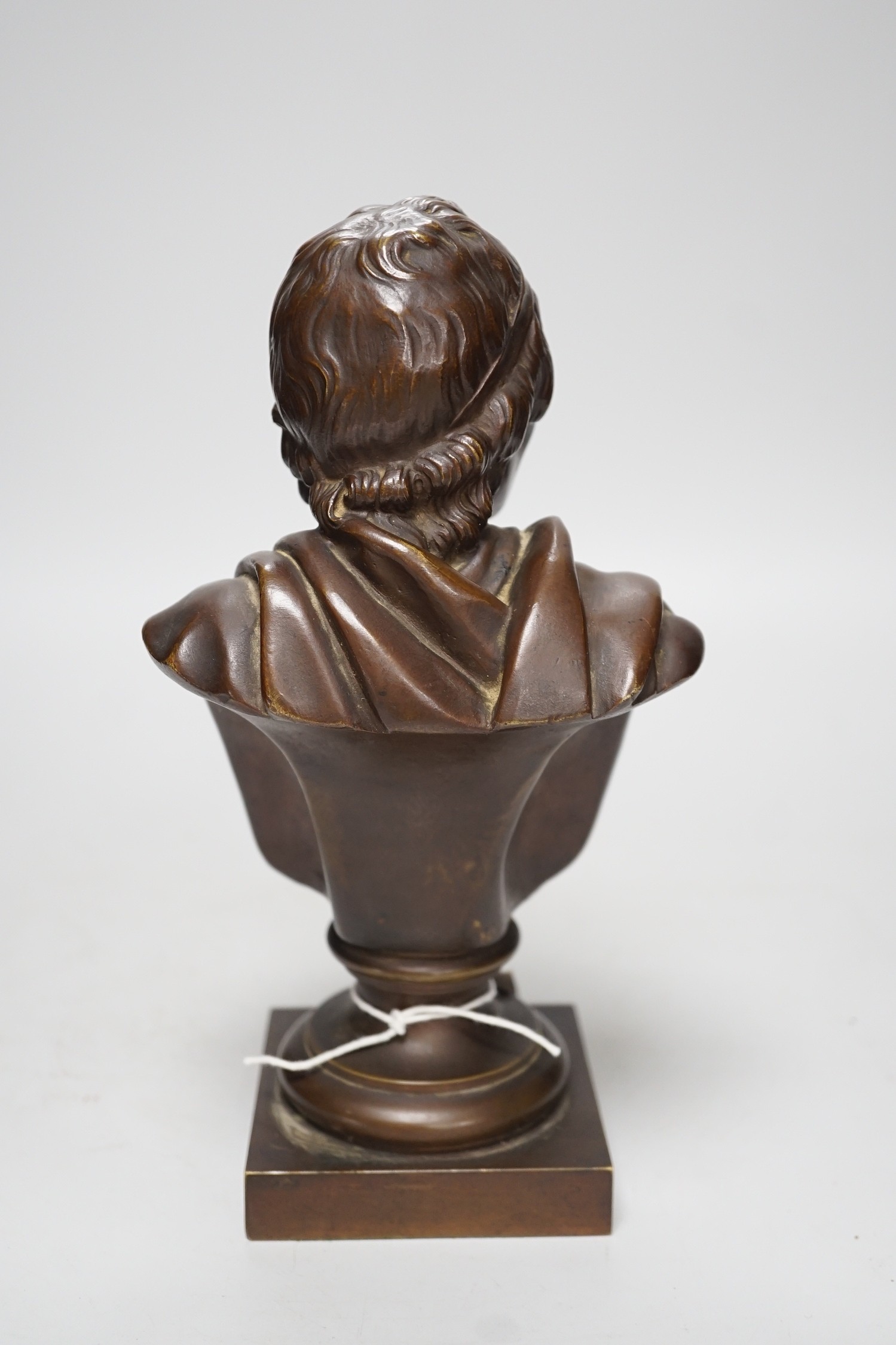An early 20th century bronze bust of Voltaire, 24cm